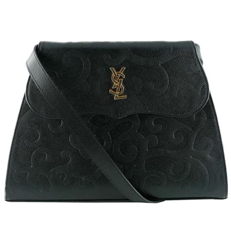 ysl bootleg|YSL vintage pouch.